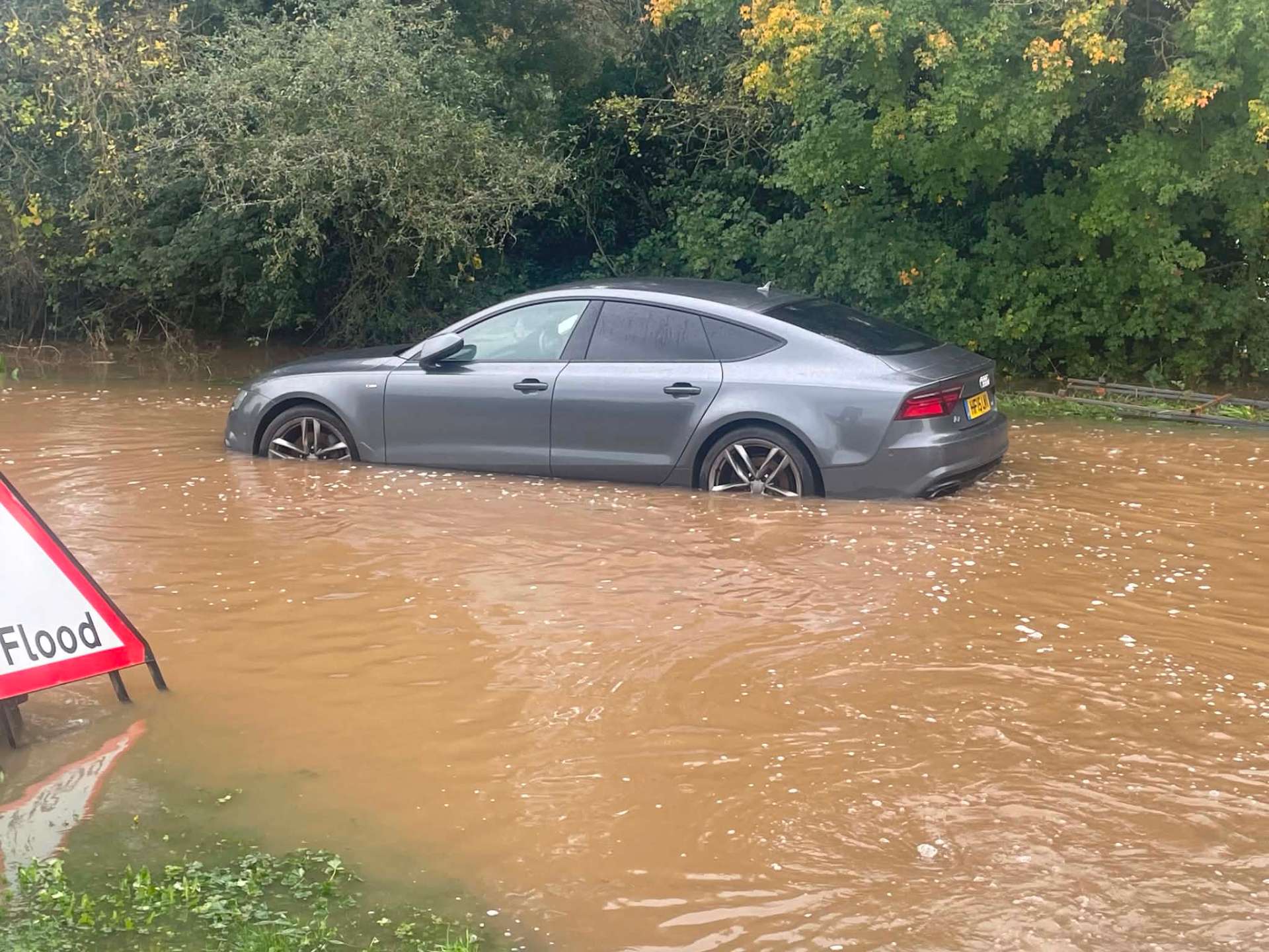 Audi A7 stranded in flood water